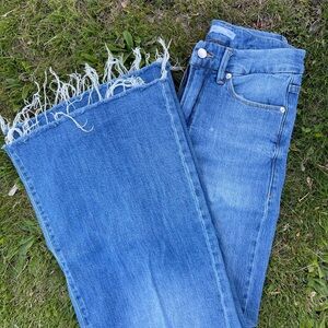 Good American Blue Flare Jeans with Frayed Hem